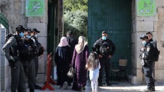 Muslim worshippers enter the Al-Aqsa Mosque compound in Jerusalem's old city