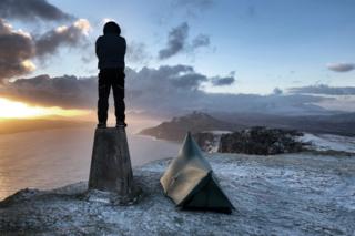 Camper and tent