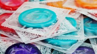 Condoms of various colours