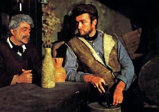Jose Calvo and Clint Eastwood in A Fistful of Dollars (1964)