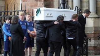 Noah's former basketball teammates were among the mourners
