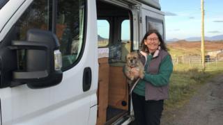 Rev Fiona Ogg and her dog Maisie with the van