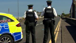 Policemen on the road
