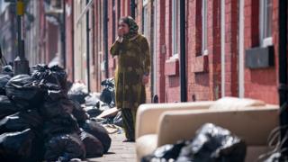 Household rubbish begins to pile high on the streets of Alum Rock in Birmingham in August 2017