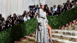 Rihanna arrives for the 2018 Met Gala on May 7, 2018 at the Metropolitan Museum of Art in New York City.  - The Gala raises funds for the Metropolitan Museum of Arts Costume Institute.  The theme for the 2018 Gala is Heavenly Bodies: Fashion and the Catholic Imagination.