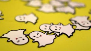 The logo of messaging app Snapchat is seen at a booth at TechFair LA, a technology job fair, in Los Angeles, California,