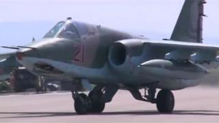 A frame grab taken from footage released by Russia"s Defence Ministry October 5, 2015, shows a Russian air force jet taxiing on the tarmac of Heymim air base in Syria.