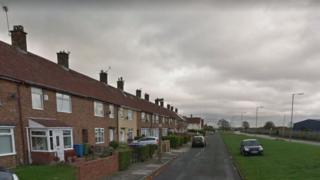 The child was injured after a trolley fell from the bonfire in Hale Drive in Speke, Liverpool
