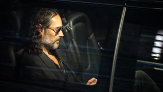 Russell Brand leaves the Troubadour Wembley Park theatre in north-west London after performing a comedy set
