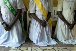 Catholics pray at a mass at the St Theresa Cathedral Church Kator, in Juba, South Sudan.