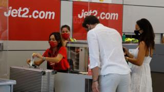 Jet2.com customers at a check-in desk