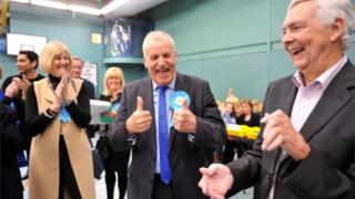Conservative candidate for Chelmsford Central, Dick Madden, celebrates with colleagues after retaining his seat in the Essex County Council local elections
