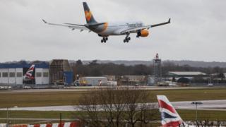An aircraft comes in to land as the runway is reopened at Gatwick Airport