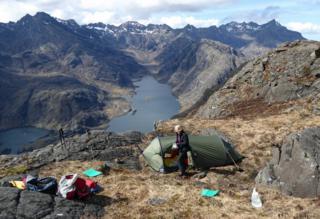 Tent on top of Sgurr na Stri, Skye showing the Black Cuillins ridge and Loch Coruisk