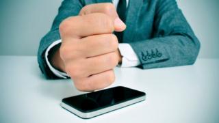 Man hitting phone