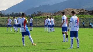 La Paz F.C. players warm up before the game