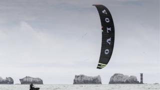 Kitesurfers racing around the Isle of Wight