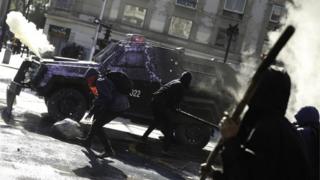 Demonstrators clash with the police during a protest in Santiago, Chile, 06 June 2018