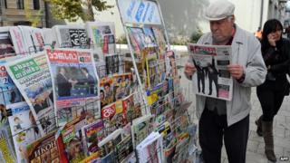 Newspaper reader in Tbilisi