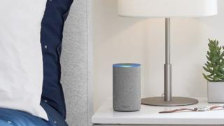 Amazon Echo by a bedside table