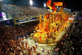 Members of the samba school of the Grupo Especial Paraiso do Tuiuti take part in the traditional carnival parade at Marques de Sapucai sambadrome in Rio de Janeiro, Brazil, early 05 March 2019