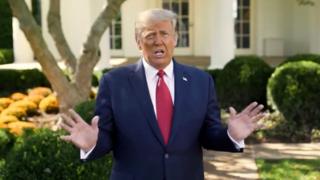 US President Donald Trump makes an announcement about his coronavirus treatment, in Washington DC