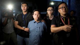 Police arrest Democratic Party member Howard Lam (C) for "misleading police" after he claimed he had been assaulted and illegally detained by mainland Chinese agents, in Hong Kong, China, China 15 August 2017