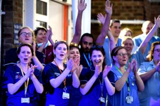 NHS staff applaud outside the Dorset County Hospital in Dorchester