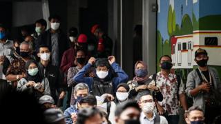 People wearing masks in the Indonesia capital Jakarta