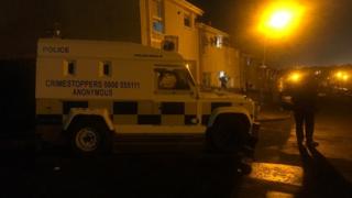 Police at scene of Velsehda court in ardoyne
