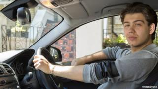 man in car