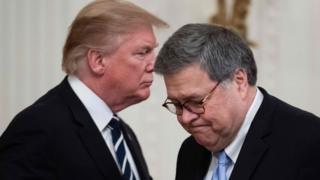 US President Donald Trump (L) shakes hands with US Attorney General William Barr