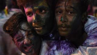 Pakistani Hindu youths celebrate the holi festival in Karachi on March 1, 2018.