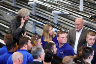 Prime Minister Theresa May takes part in a Q&A with staff at Express Bi-folding Doors, a family-owned business in Leeds.