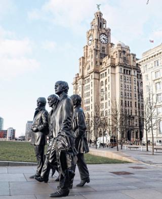 A statue of The Beatles