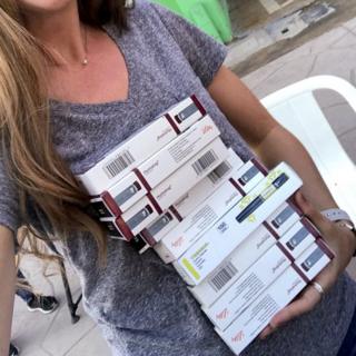 Emily Mackey holding insulin pens that she bought in Mexico