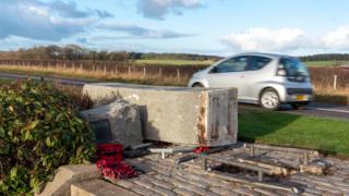 Damaged war memorial