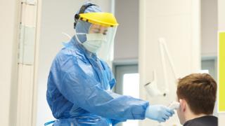 Generic image of medical worker in protective clothing