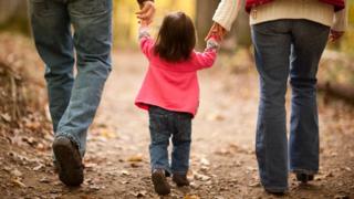 Family holding hands