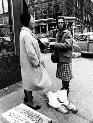 Two women with two chickens, 1966.