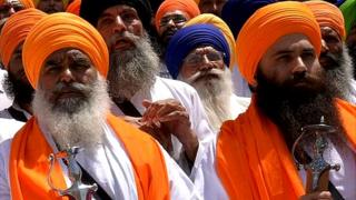 Dhian Singh Mand (C), Amrik Singh Ajnala (L), and Baljit Singh Daduwal (R)