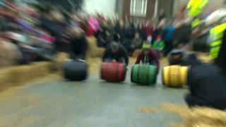 Men with barrels