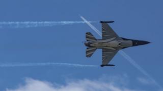 Belgian Air Force F-16 AM fighting jet, a military war aircraft on an aerobatic air show display during the 53rd Paris Air Show in Le Bourget Airport LBG in France.