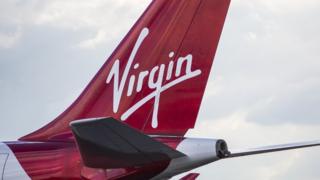 Tail of Virgin aeroplane displaying the Virgin logo