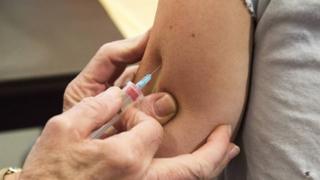File image of a measles, mumps rubella vaccine being given to a student in Chapman University, Orange County, in April 2017
