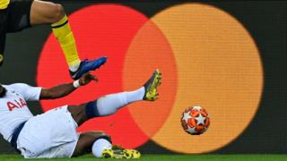 Ivory Coast and Tottenham defender Serge Aurier vies for the ball against rivals Borussia Dortmund during their UEFA Champions League match on Tuesday, in Dortmund, western Germany.
