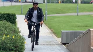 Student on University of Bolton bike