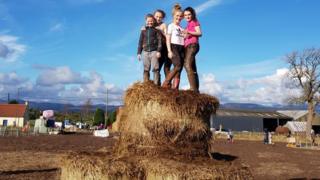 children on hay bales at Arnprior Pumpkin Patch in Stirling