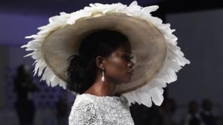A model presents a creation by designer Yemi Shoyemi during the Lagos Bridal Fashion Week in Lagos on May 4, 2018