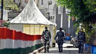 Paramilitary personnel seen at the cordoned off entry route to the Tablighi Jamaat's Alami Markaz Banglewali Masjid building on day twenty of the 21-day nationwide lockdown in India